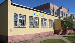 Одноэтажное кирпичное здание магазина с навесом, Гомельская обл., г. Жлобин, ул. Молодежная, 2г  
